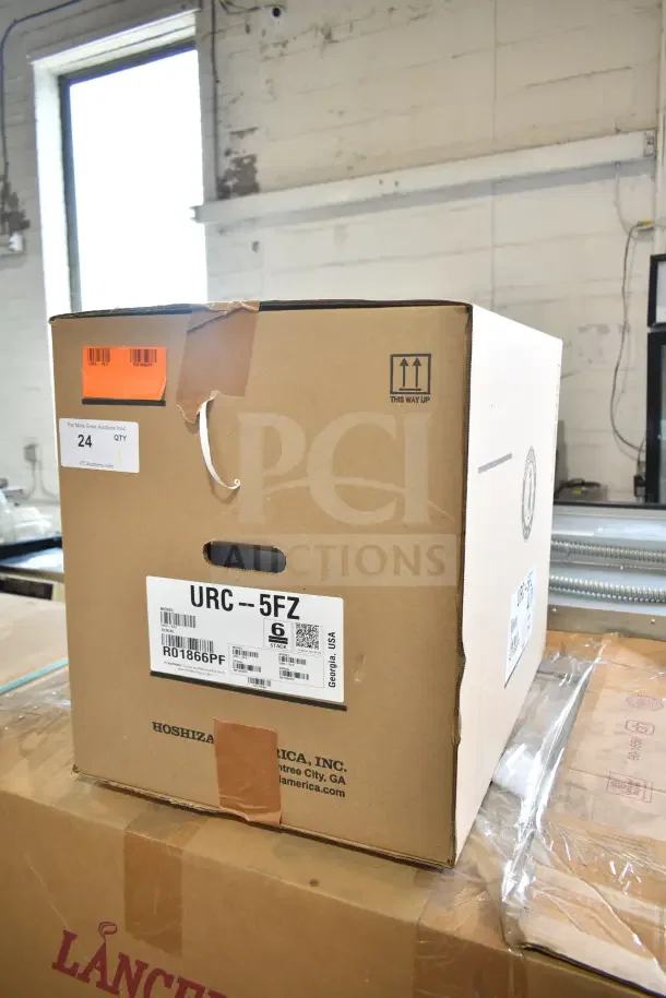 Brand new Hoshizaki URC-5FZ air-cooled remote ice machine compressor box, 115V, 1 phase, labeled with shipping details.
