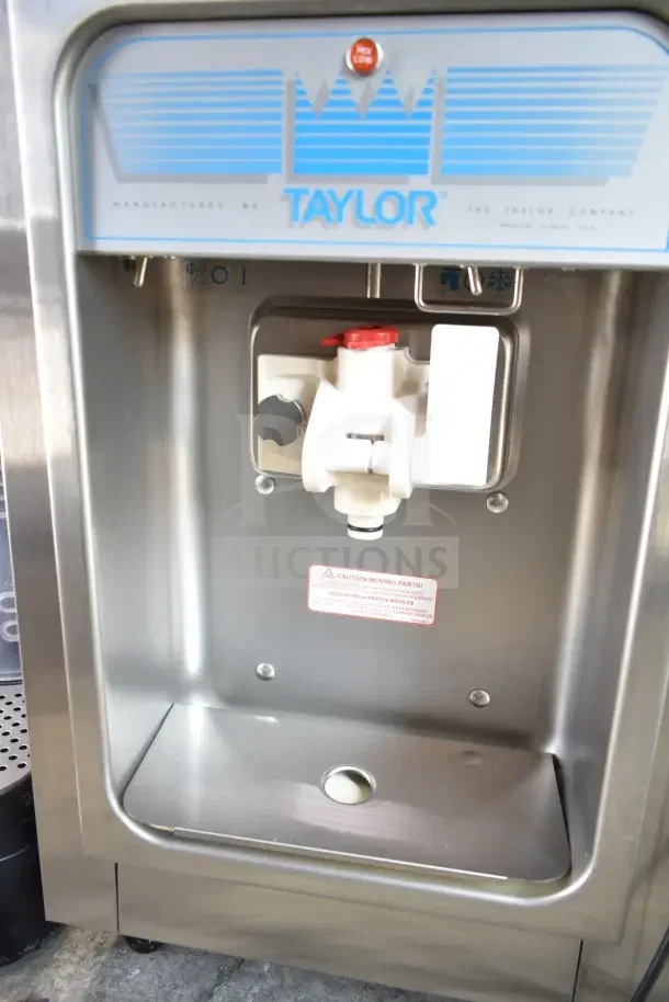 Taylor Commercial Countertop Ice Cream Machine, single flavor, 208 volts, clean condition, caution label on panel.