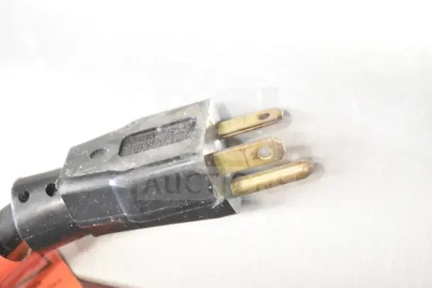 Close-up of a plug from a Taylor Commercial Countertop Single Flavor Ice Cream Machine, 208 volts.