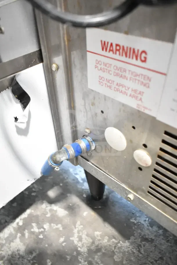 2016 Ice-O-Matic ICEU220HA3 commercial ice machine, showing warning label about drain fitting. 115V, 1 Phase.