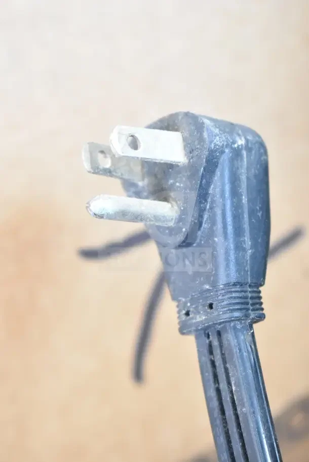Close-up of a power cord plug from a 2016 Ice-O-Matic ICEU220HA3 Commercial Ice Machine, 115 volts, 1 phase.
