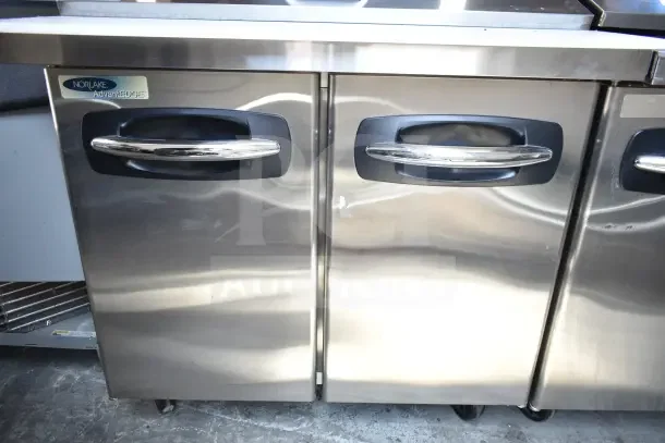 Norlake SMP36-15 sandwich salad prep table, stainless steel, dual-door, on commercial casters, 115V, 1 phase, logo visible.