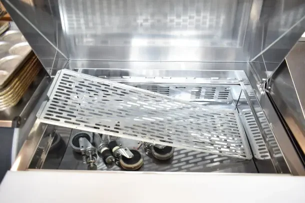 Norlake SMP36-15 commercial prep table, bain marie top, on casters, 115V, 1 phase, shown with interior grid and wheels.