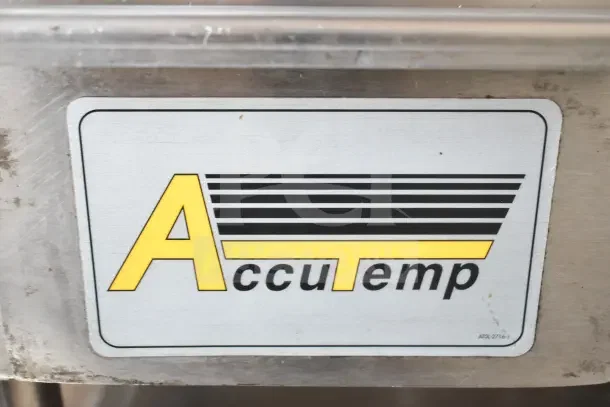 AccuTemp EGF4803B3600-T1 36"x24" electric griddle label showing logo and model on stainless steel surface.