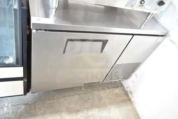True TUC-44 commercial undercounter cooler, stainless steel, single door, 115 volts, 1 phase, visible wear.