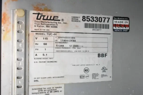 True TUC-44 Commercial Undercounter Cooler label showing model, voltage, refrigerant, and serial number details.