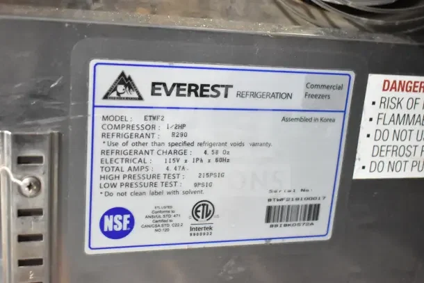 Everest ETWF2 Commercial 2 Door Undercounter Freezer label showing model, compressor, refrigerant, and electrical specs. NSF certified.