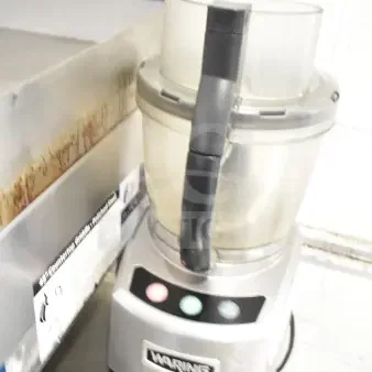 Waring countertop food processor, stainless steel, 120 volts, 1 phase, includes control panel with buttons.