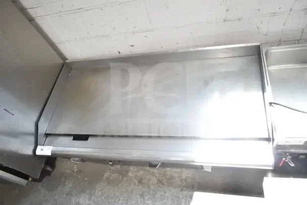 APW Wyott commercial countertop flat top griddle, stainless steel, gently used, perfect for restaurant kitchens.