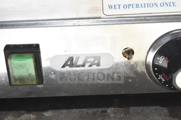 Alfa FW9000 Commercial Food Warmer, 120V, 1 Phase. Features include control settings and power switch. "Wet Operation Only" label.