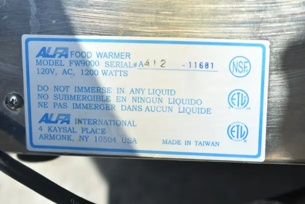 Alfa FW9000 Commercial Food Warmer, 120V, 1200W. ETL, NSF certified. Label advises not to immerse in liquid. Made in Taiwan.