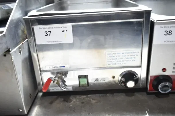Alfa FW9000 Commercial Countertop Food Warmer, stainless steel, 120V, 1-phase, with control dial and caution label.