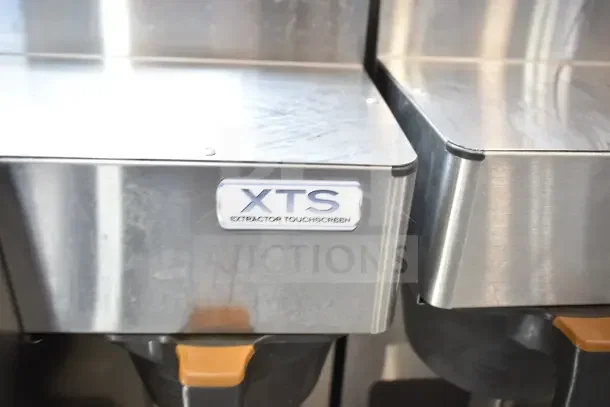 Fetco CBS-2132-XTS Commercial Coffee Machine, stainless steel finish, XTS Extractor Touchscreen label visible.