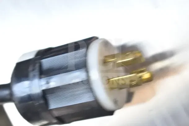Power plug of Fetco CBS-2132-XTS Commercial Coffee Machine, 200-240V, 1 Phase, shown close-up.