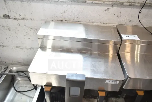 Fetco CBS-2132-XTS commercial double coffee machine in stainless steel. Features XTS label, 200-240V, 1 phase.