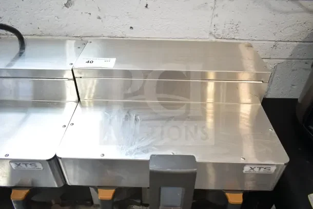Fetco CBS-2132-XTS commercial coffee machine, stainless steel, dual brewers, 200-240V, tag reads "40 QTY."