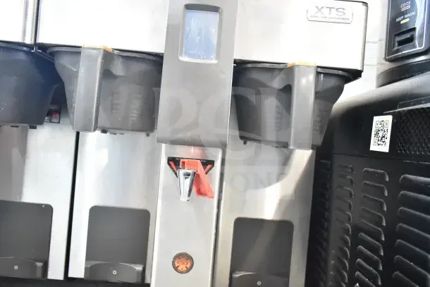 Fetco CBS-2132-XTS commercial coffee machine, dual brewers, silver finish, touchscreen, EUC, 200-240V, 1 Phase.