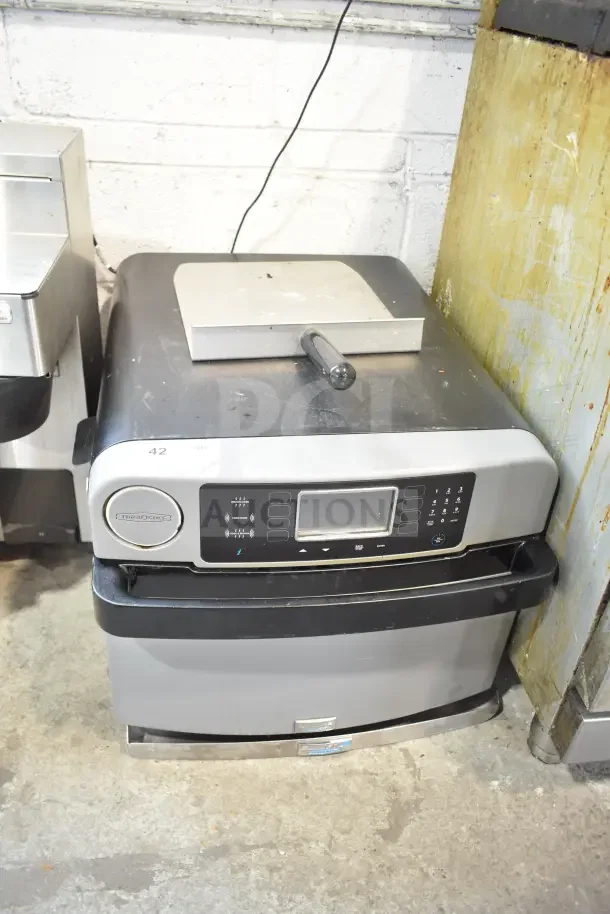 Turbochef ENC2 commercial countertop electric rapid cook oven, 208/240V, 1 phase; features control panel, fair condition.