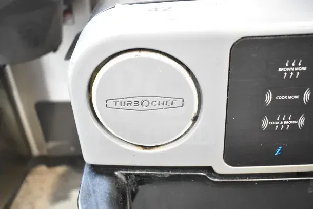 Turbochef ENC2 rapid cook oven, electric, countertop model, 208/240 volts, 1 phase. Features control panel and logo.