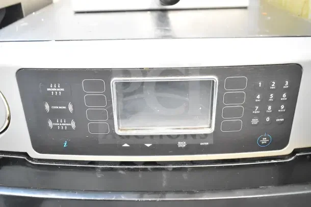 Turbochef ENC2 rapid cook oven, commercial countertop electric. Features control panel. 208/240V, good condition.