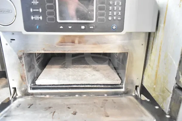 Turbochef ENC2 commercial electric rapid cook oven, 208/240V, 1 phase. Visible wear inside, front control panel intact.