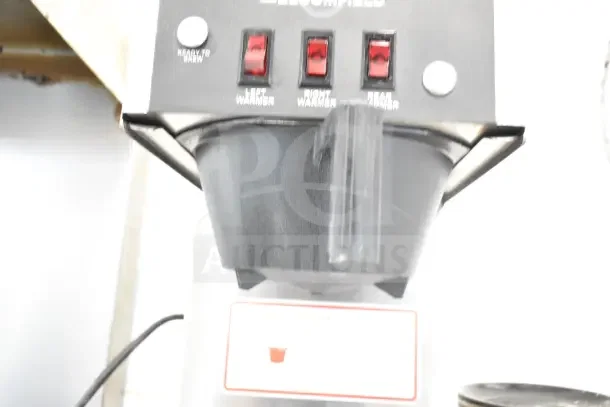 Bloomfield 8571 countertop 3 burner coffee machine, 120 volts, 1 phase, switches for left, right, and rear warmer.