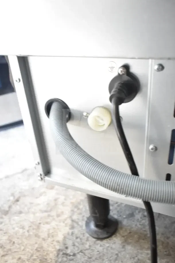 2024 Avantco 194UCF280A undercounter ice machine, showing rear power and drain connections, 115V, 1 Phase, good condition.