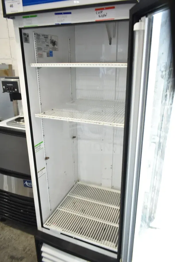 True GDM-23 Commercial Cooler, single door, reach-in, 115V, 1-phase, clean white interior, includes shelving, visible usage marks.