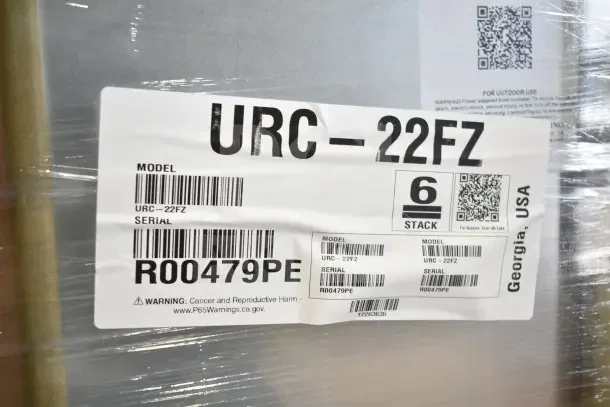 Brand new Hoshizaki URC-22FZ air-cooled remote ice machine compressor in packaging. Model and serial labels visible.