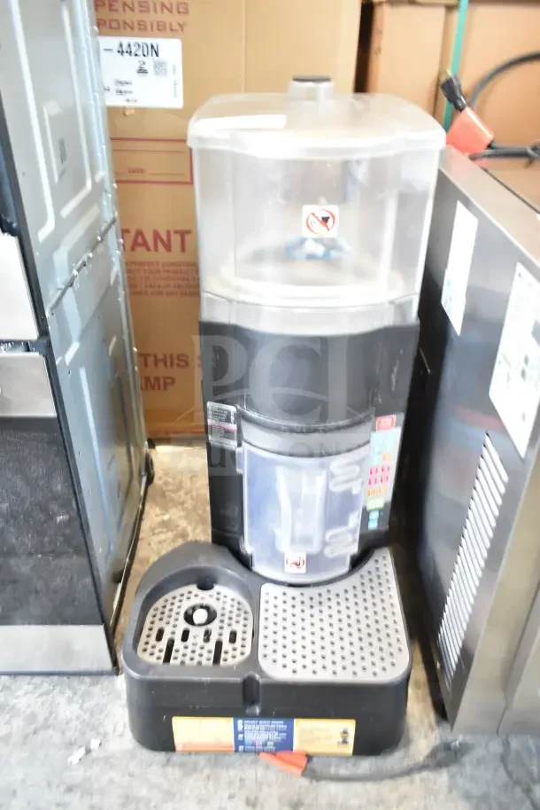 Taylor X83684-12 commercial countertop frozen beverage mixer, 115V, 1 phase, used condition, no visible damage.