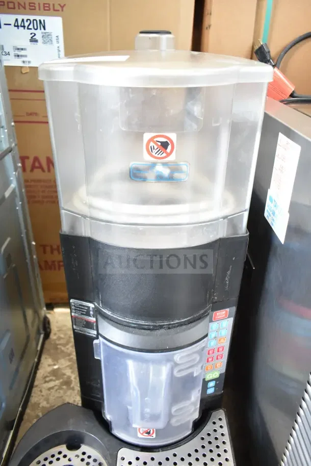Taylor X83684-12 commercial frozen beverage machine, countertop model, 115V, 1-phase, visible buttons and safety label.