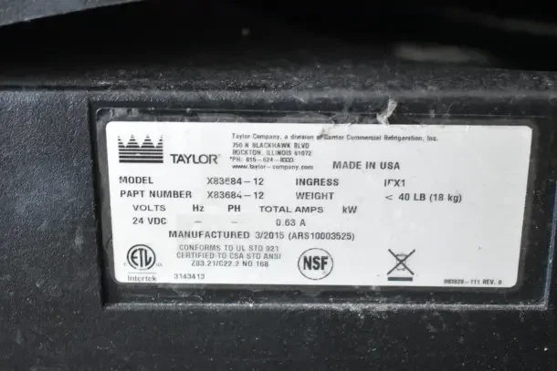 Taylor X83684-12 frozen beverage machine label; 115V, 1 phase, 0.63A, 24VDC. Made March 2015, NSF certified.