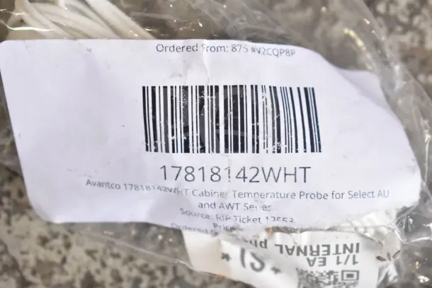 Clear plastic packaging with a label showing barcode and "Avantco 17818142WHT Cabinet Temperature Probe for Select AU and AWT Series."