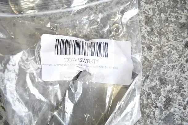 Bag with Avantco 177APSWBKT1 single height mounting bracket for 60" strip warmer; label visible with barcode.