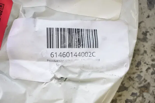 Barcode label showing a product code "61460144002C" on packaging; associated with Pitco parts. Packaging slightly damaged.