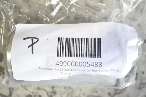 Plastic-wrapped Manitowoc Ice capacitor with barcode, model 000005488, 50Mfd 370Vac, in new condition.