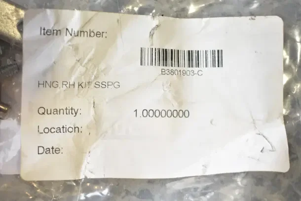 Clear plastic bag containing multiple items with a label reading "Item Number: B3801903-C" and "HNG RH KIT SSPG."