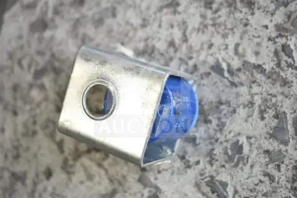 Metal mounting bracket with blue component, brand new condition, slight scratch visible.