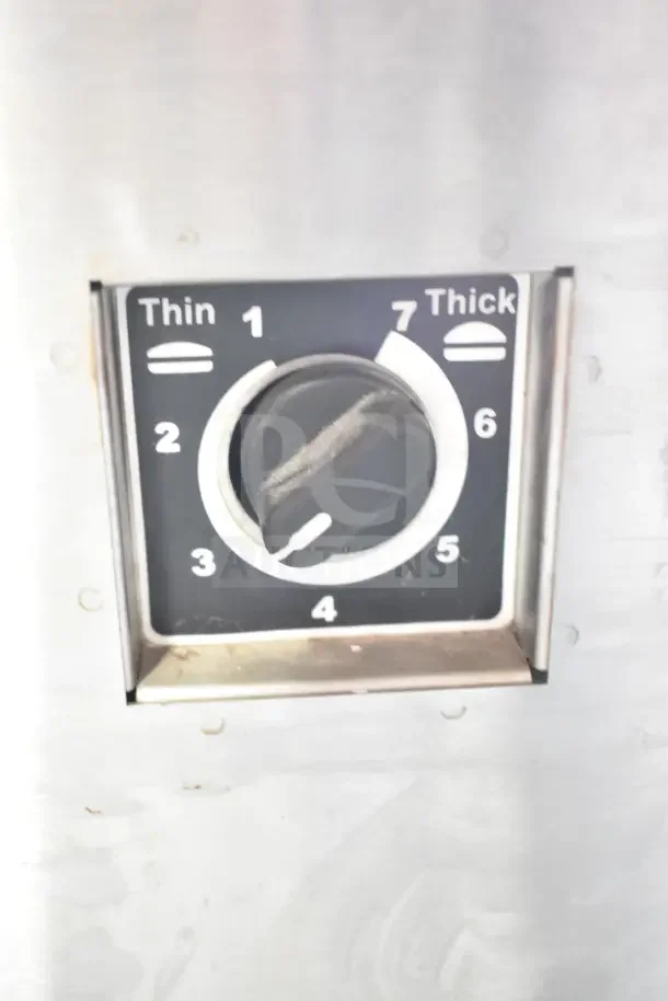 AJ Antunes GST-2H bun toaster dial showing thickness settings from 1 to 7, encased in stainless steel panel.