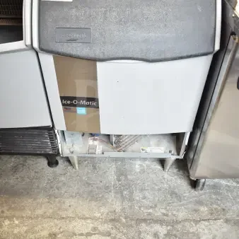 2016 Ice-O-Matic ICEU220HA3 ice machine, commercial, self-contained, 115V, 1 phase, visible brand markings, good condition.