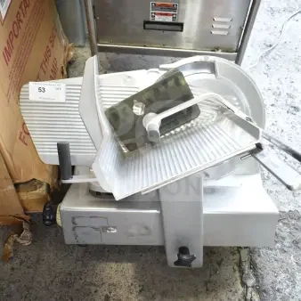 Bizerba Commercial Countertop Meat Slicer, 120V, 1 Phase, used condition. Features adjustable blade and safety guard.