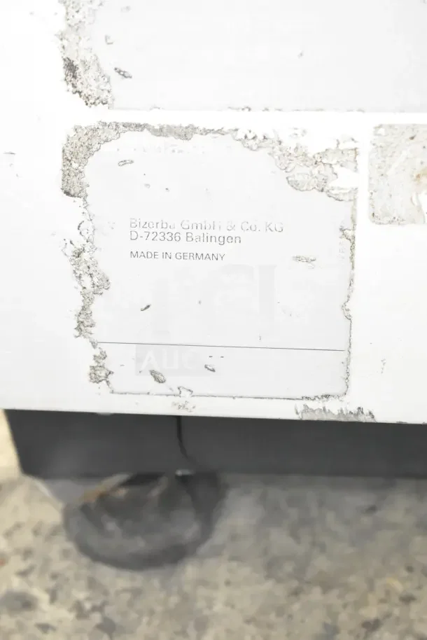 Bizerba Commercial Meat Slicer label; worn, indicates "Made in Germany" by Bizerba GmbH & Co. KG, D-72336 Balingen.