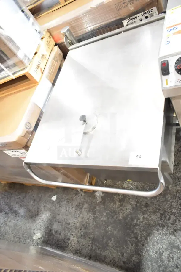 Cleveland manual tilt gas-powered braising pan, commercial floor style, stainless steel, good condition, visible control panel.