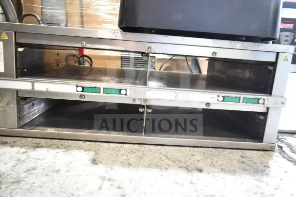 Prince Castle DHB2PT-33KFCB commercial countertop holding bin, 208-240V, 1 phase, shows dual compartments, used condition.