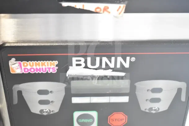 Bunn MHG 35600.0011 commercial coffee grinder; 2 hopper, missing lids, 120V, 1 phase. Dunkin' Donuts branding visible.
