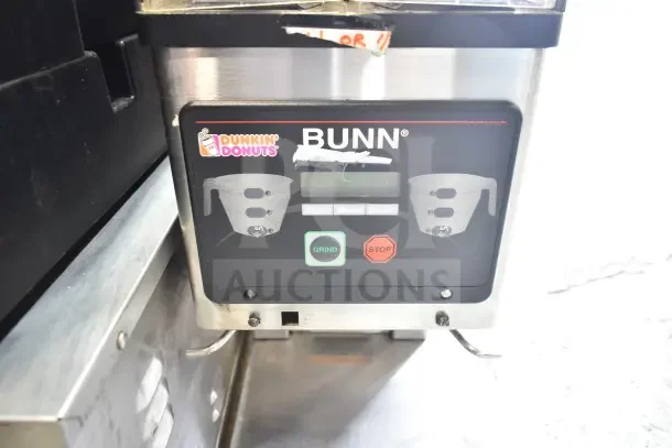 Bunn MHG 35600.0011 Countertop Coffee Bean Grinder, 2 Hopper, missing lids, 120V, Dunkin' Donuts branding.
