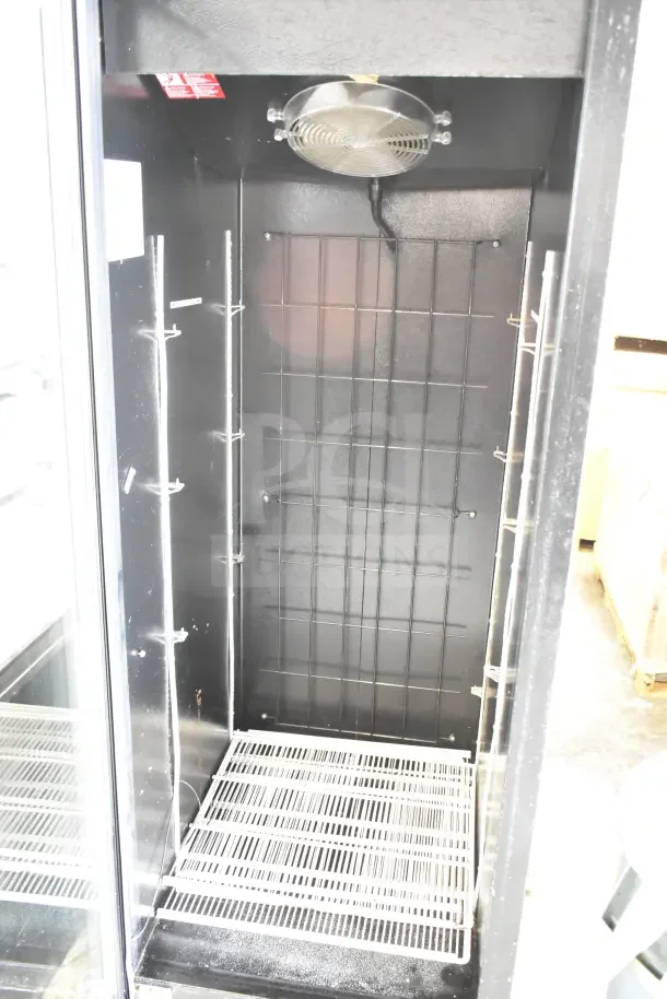 Master-Bilt IM-23GB commercial freezer with a single glass door, sturdy shelving, and a fan at the top. 115/208-230V, 1 phase.