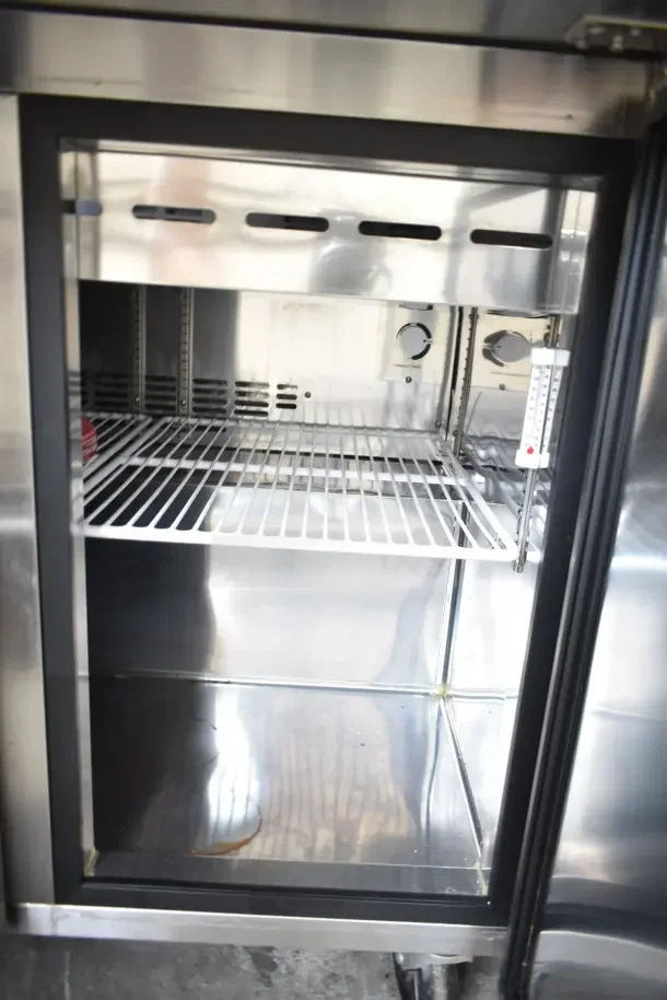 Norlake SMP36-15 Commercial Sandwich Salad Prep Table with mega top, stainless steel interior, and caster wheels. 115V, 1 Phase.