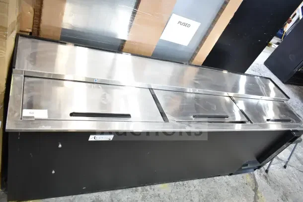Brand new Avantco 178HBB95HC 95" black horizontal bottle cooler, slight scratches, 115V, 1 phase, stainless steel top.