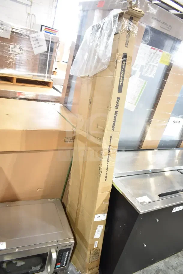 Brand new ServIt 72" lighted double strip warmer in original packaging. Features dual toggle controls, 120 Volts, 1 Phase.